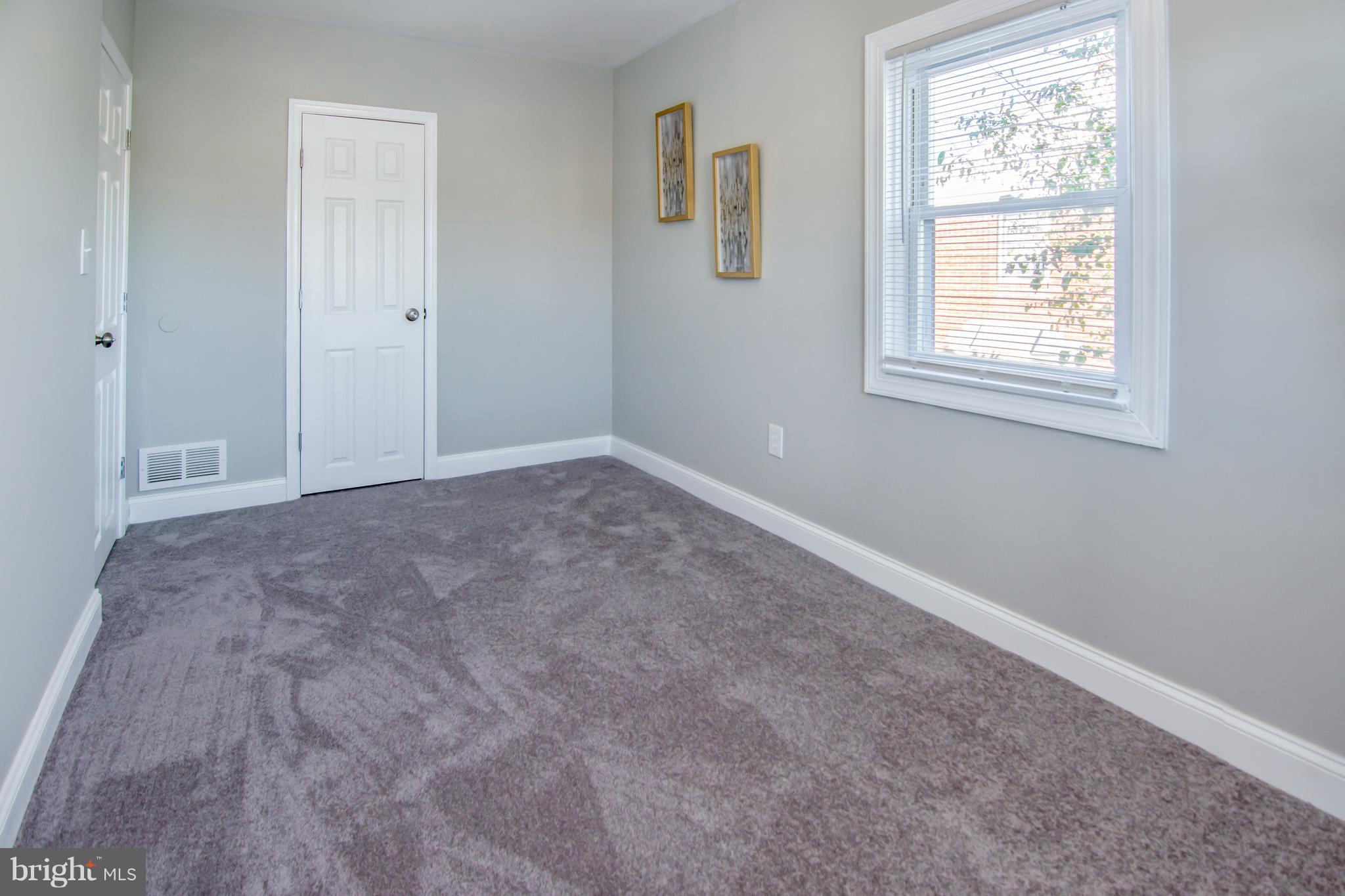 2056 Jasmine Road Dundalk, MD 21222 - Photo 27 of 30 a view of an empty room with a window