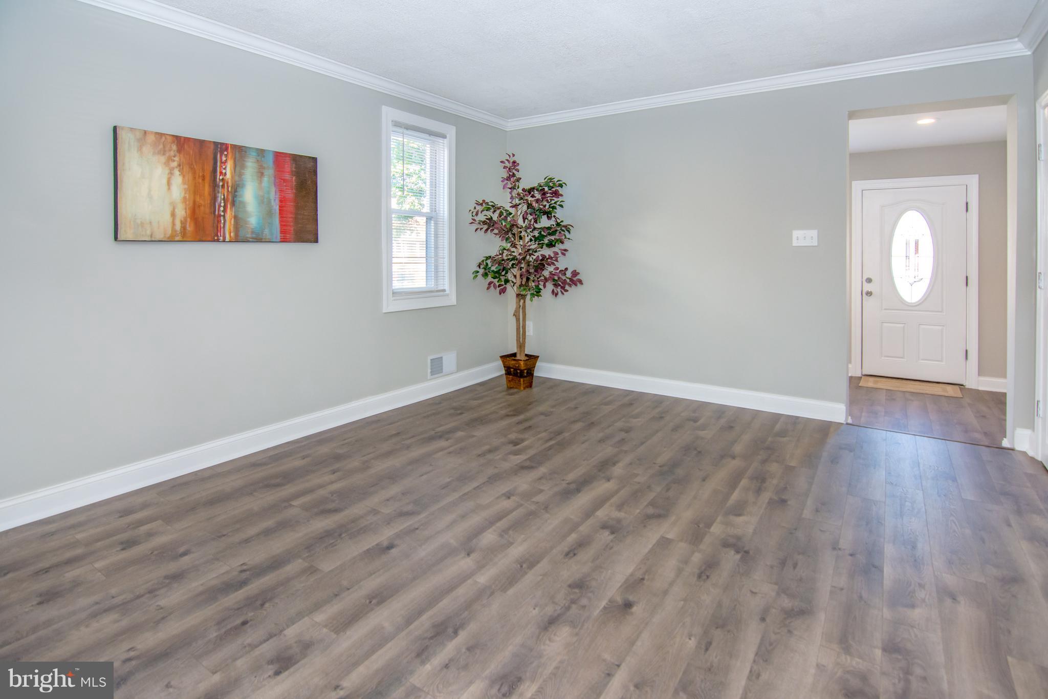 2056 Jasmine Road Dundalk, MD 21222 - Photo 7 of 30 a view of empty room with wooden floor