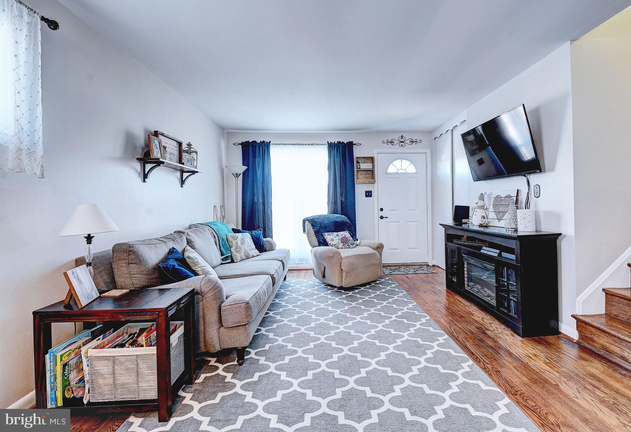 3415 Upton Road Baltimore, MD 21234 - Photo 14 of 35 From living room, choose up or down from stairs!