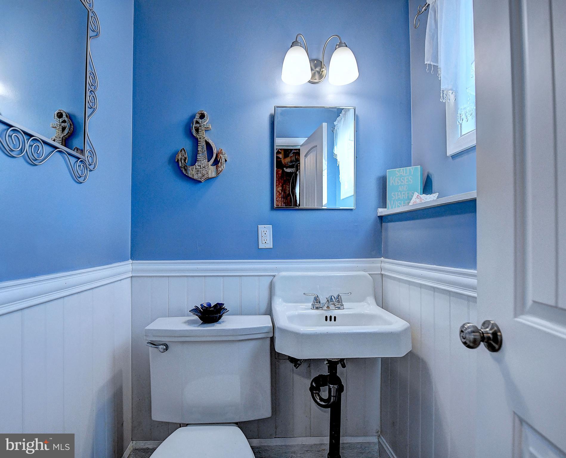 3415 Upton Road Baltimore, MD 21234 - Photo 33 of 35 Powder room in lower level with wainscoting.