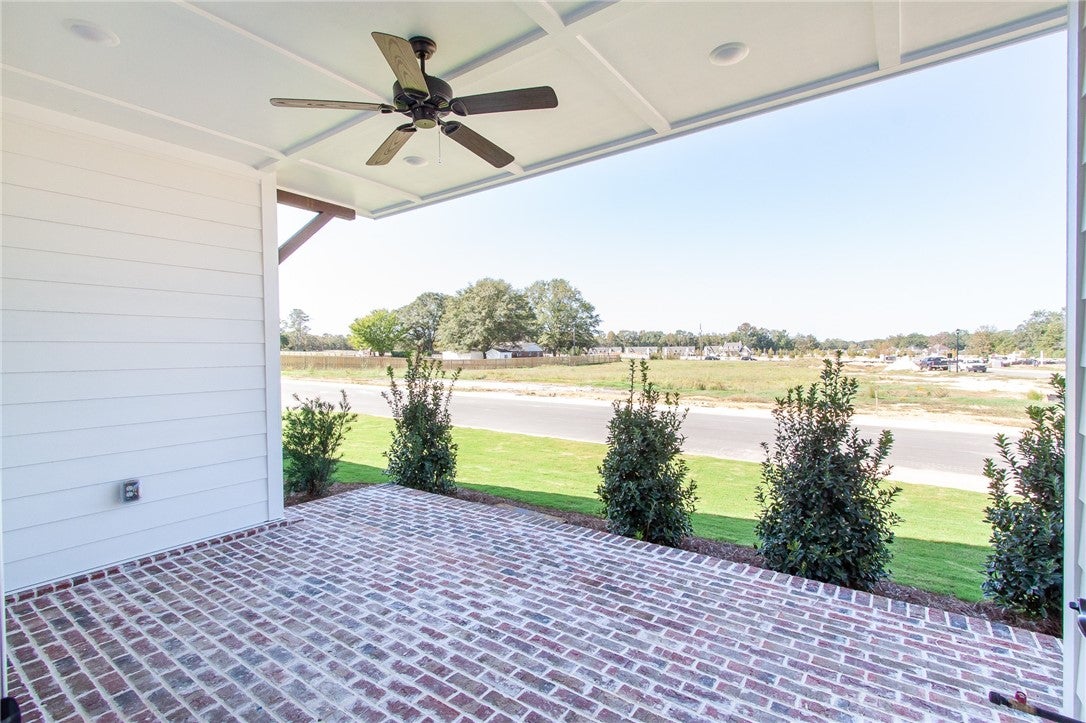 305 Coscoroba Road Auburn, AL 36832 - Photo 2 of 21 COVERED SIDE PATIO W/BRICK PAVERS