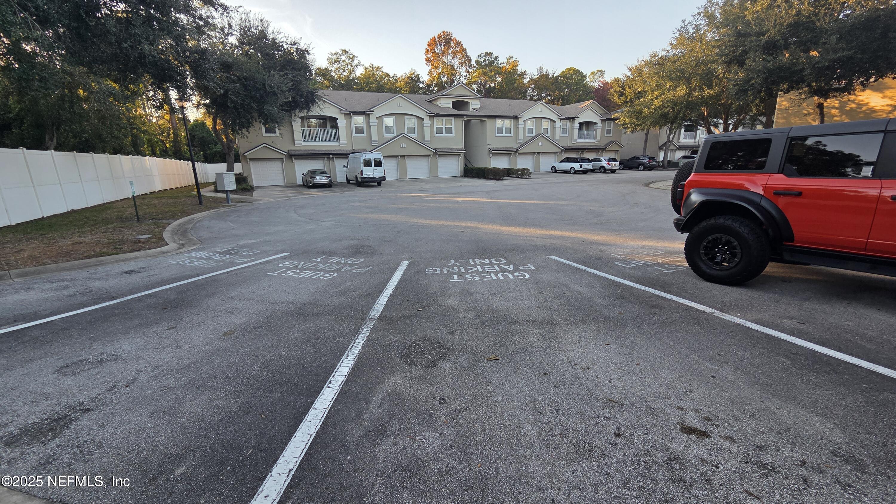 9400 Underwing Way, Unit 9 Jacksonville, FL 32257 - Photo 11 of 30 a car parked on the side of the road