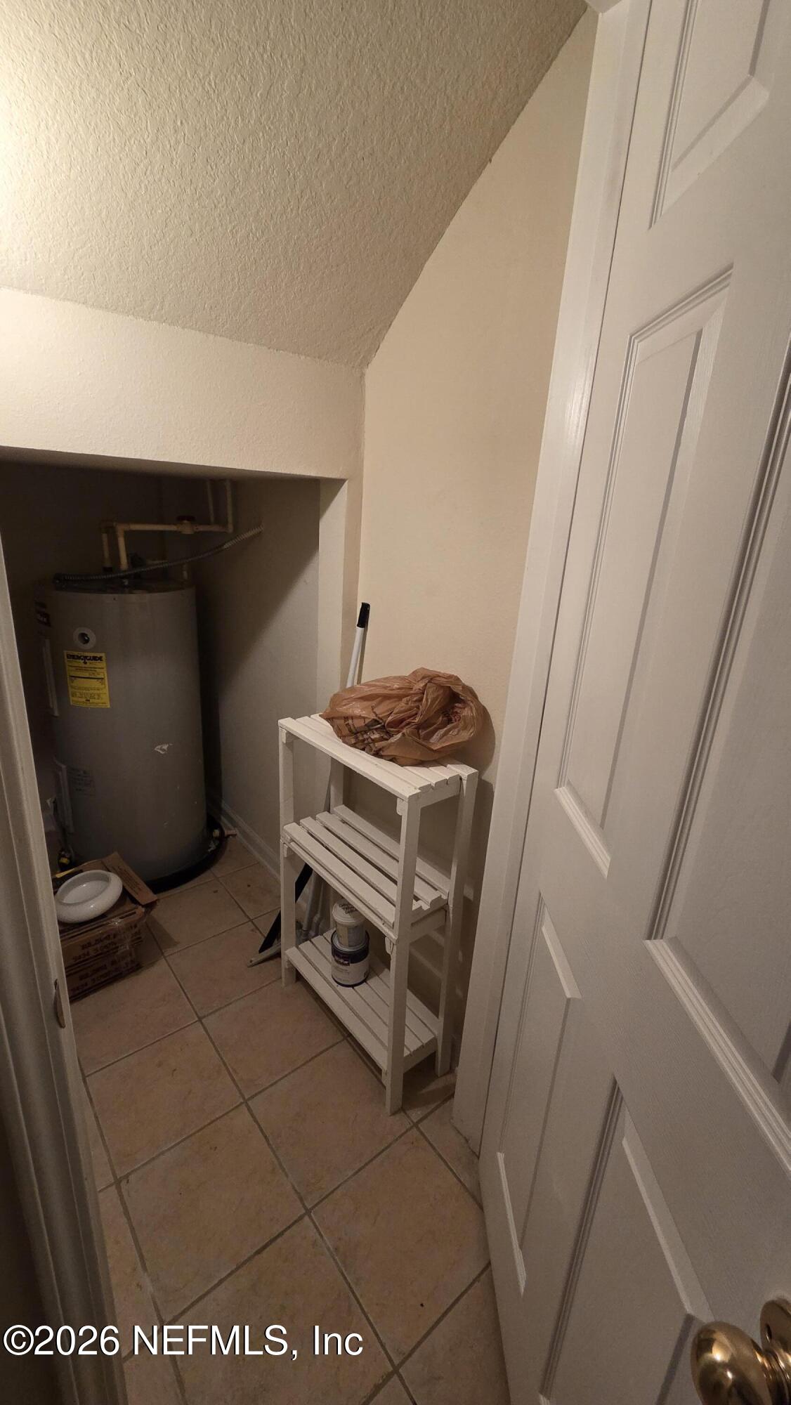 9400 Underwing Way, Unit 9 Jacksonville, FL 32257 - Photo 14 of 30 a utility room with dryer and washer
