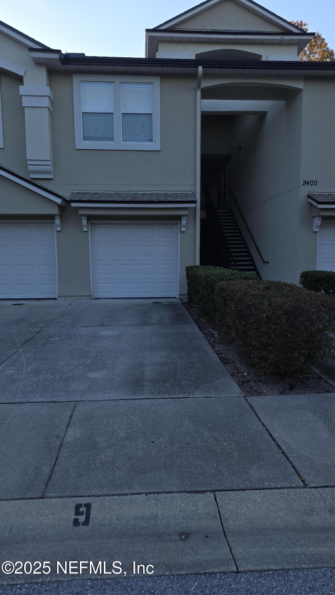 9400 Underwing Way, Unit 9 Jacksonville, FL 32257 - Photo 7 of 30 a living room with a fireplace