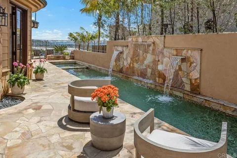 a view of a porch with furniture