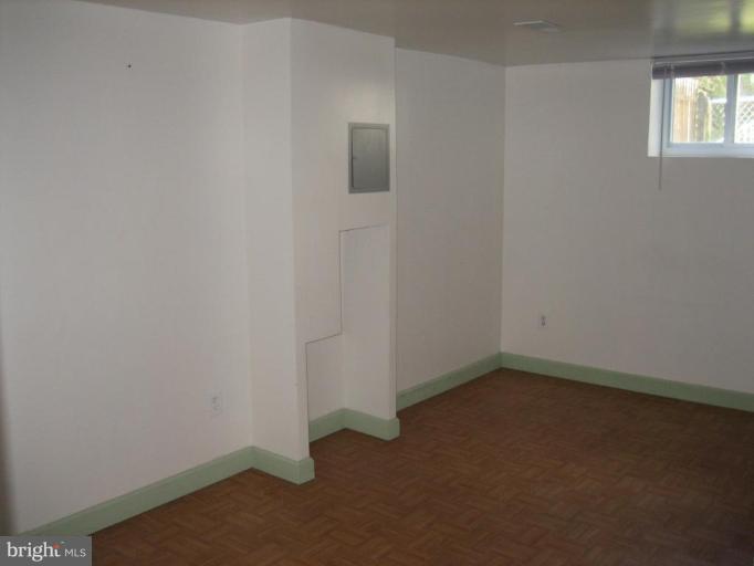 11705 Idlewood Road Silver Spring, MD 20906 - Photo 8 of 10 an empty room with a empty space
