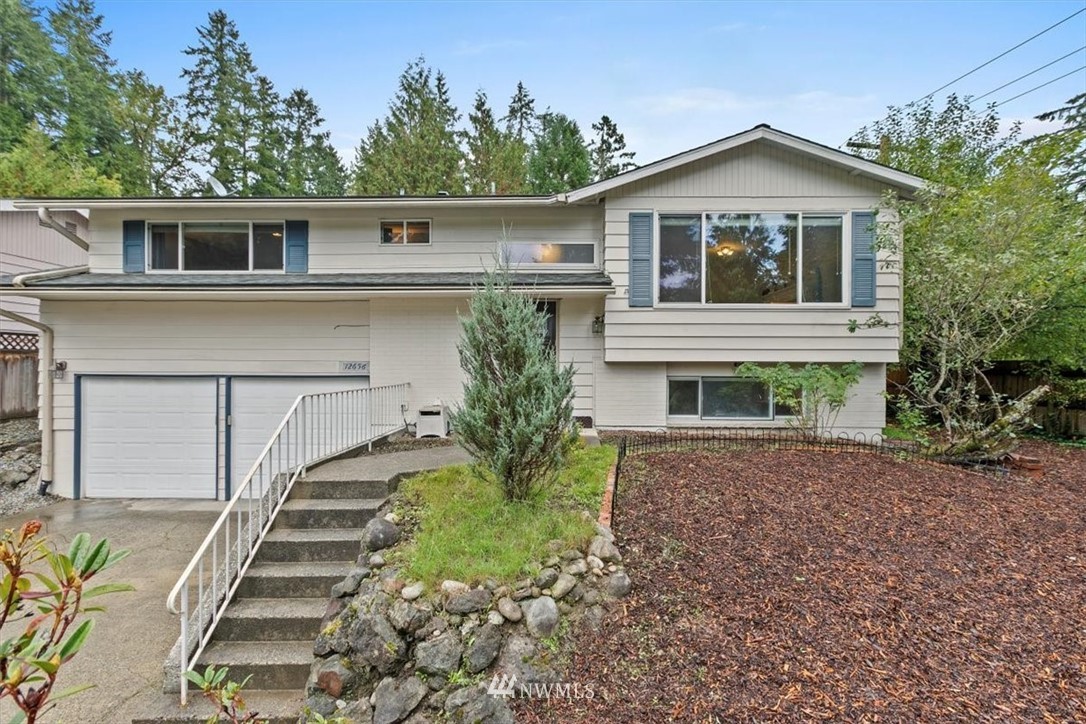 12656 177th Place Southeast Renton, WA 98059 - Photo 1 of 27 a front view of a house with a yard