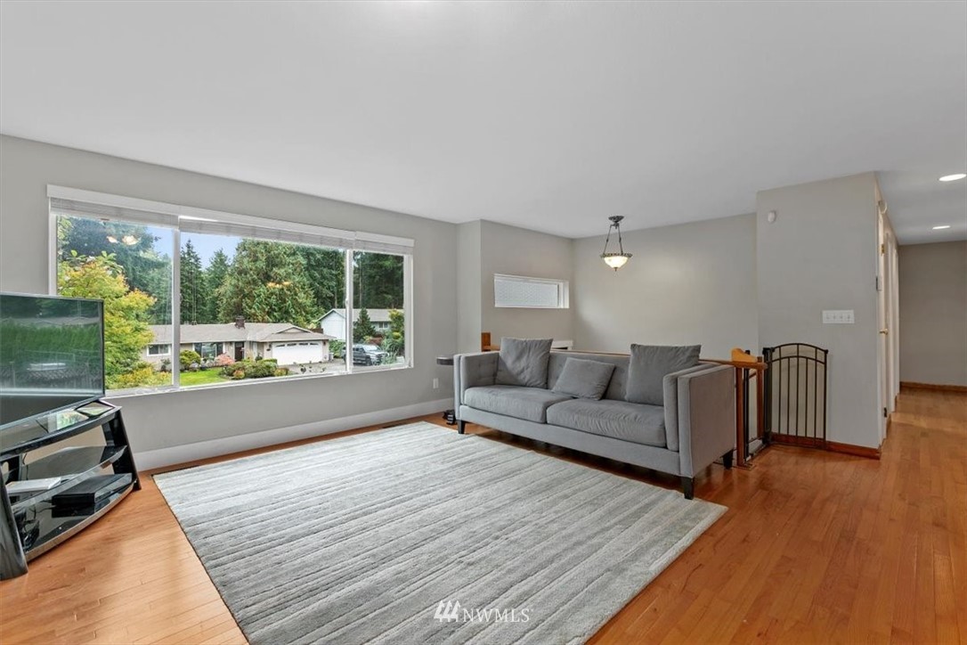 12656 177th Place Southeast Renton, WA 98059 - Photo 3 of 27 a living room with furniture and a large window