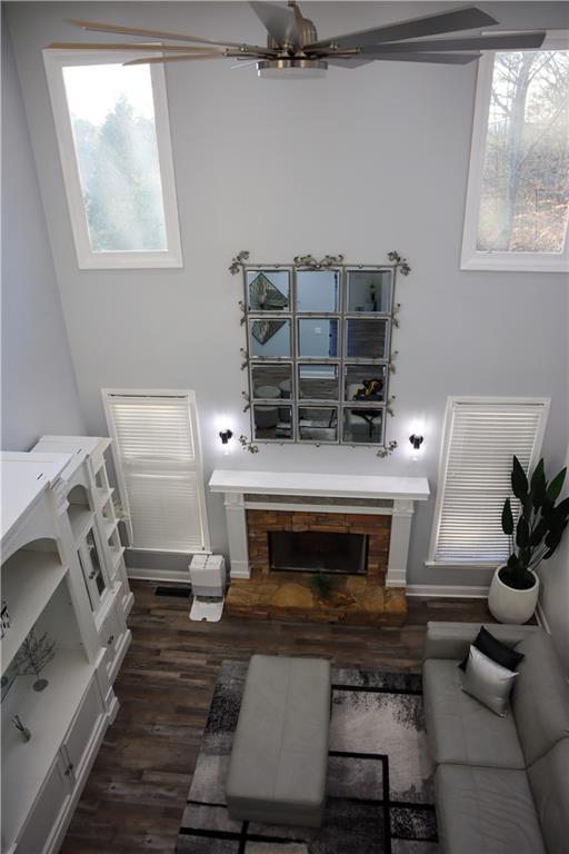 523 Waterside Court Canton, GA 30114 - Photo 15 of 28 a living room with furniture and a fireplace