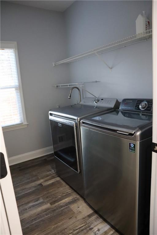 523 Waterside Court Canton, GA 30114 - Photo 19 of 28 a utility room with dryer and washer