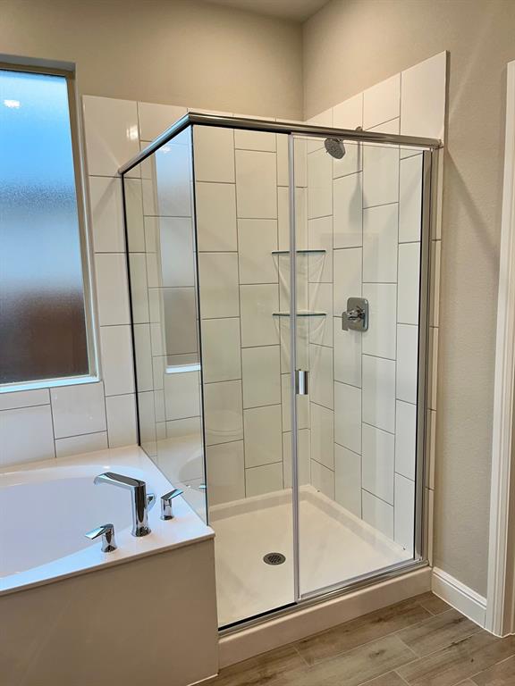 11505 Adare Drive Haslet, TX 76052 - Photo 11 of 17 a bathroom with a shower and a tub