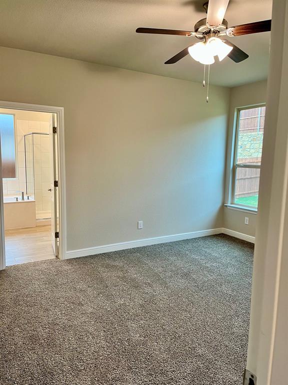 11505 Adare Drive Haslet, TX 76052 - Photo 9 of 17 a view of an empty room and window
