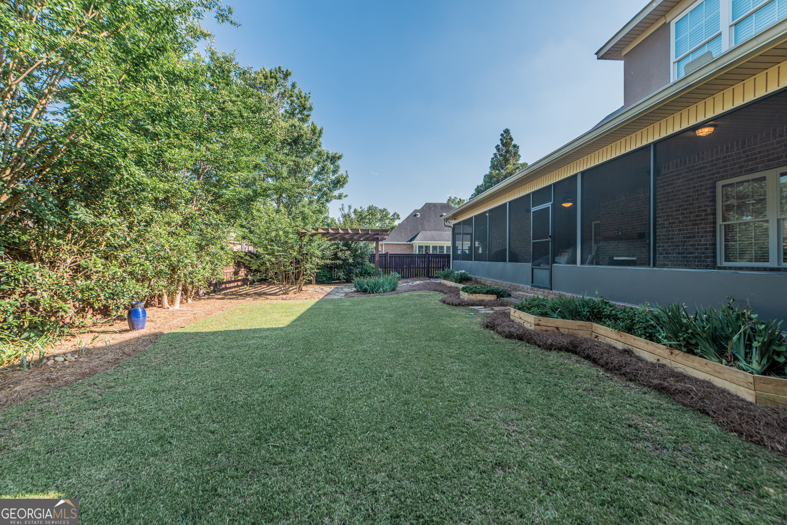 405 Old Bridge Road Warner Robins, GA 31088 - Photo 54 of 55 a view of a back yard of the house