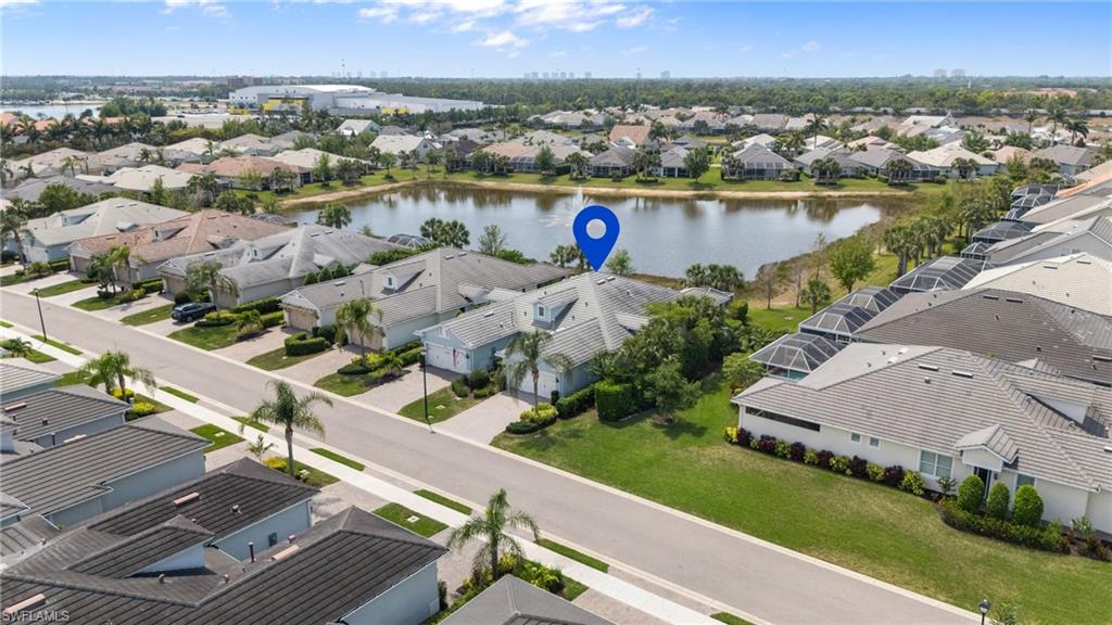 20128 Torch Key Way Estero, FL 33928 - Photo 2 of 50 an aerial view of a house with a lake view