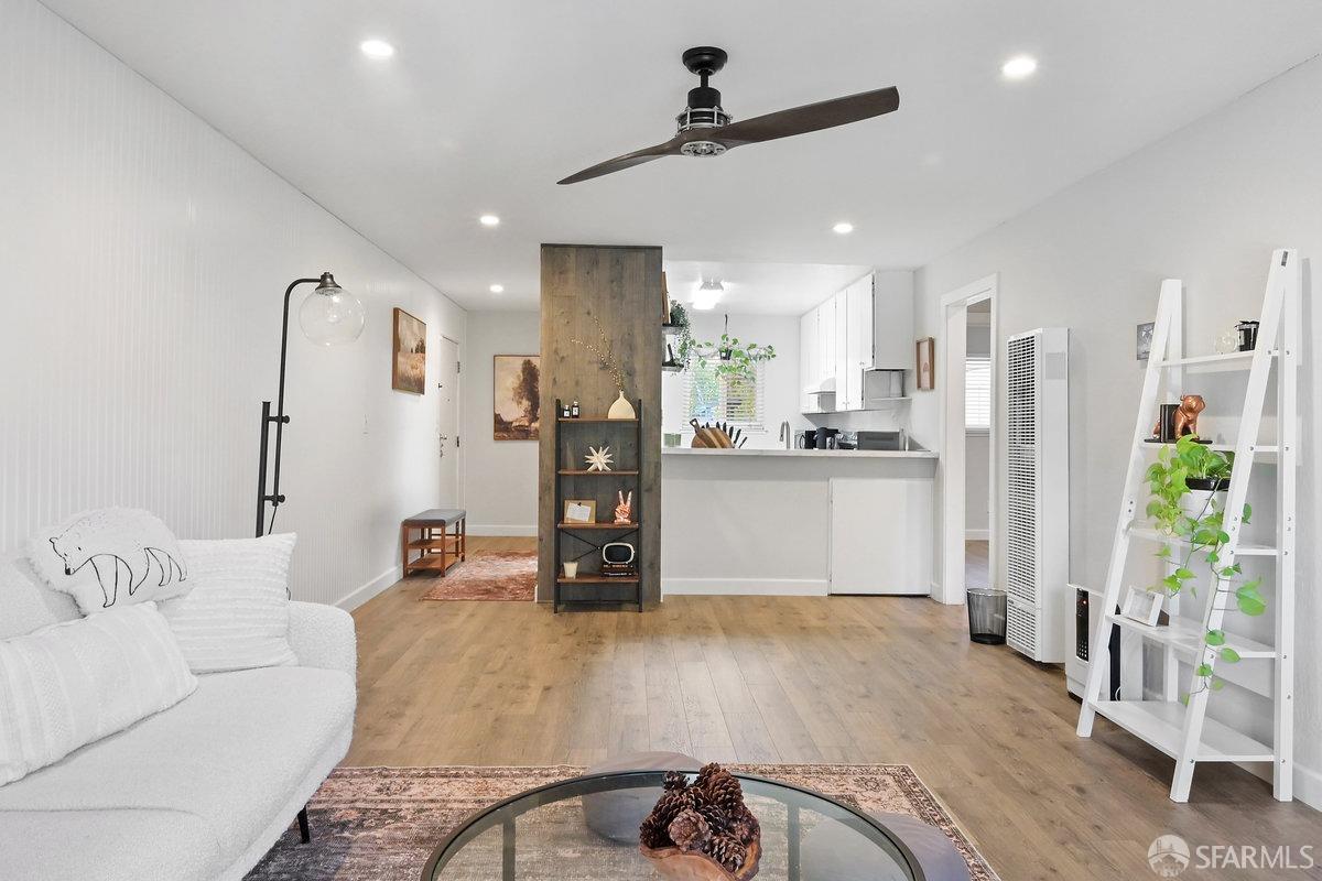 1060 Oak Grove Road, Unit 64 Concord, CA 94518 - Photo 1 of 14 a living room with furniture and kitchen view
