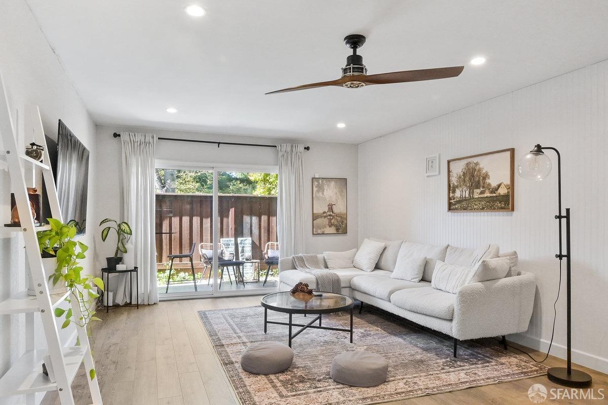 1060 Oak Grove Road, Unit 64 Concord, CA 94518 - Photo 2 of 14 a living room with furniture and a large window