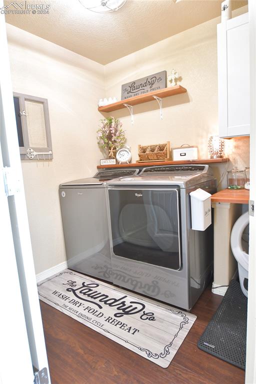 6290 Bearcat Loop Colorado Springs, CO 80925 - Photo 34 of 49 a view of a kitchen with a sink and a stove