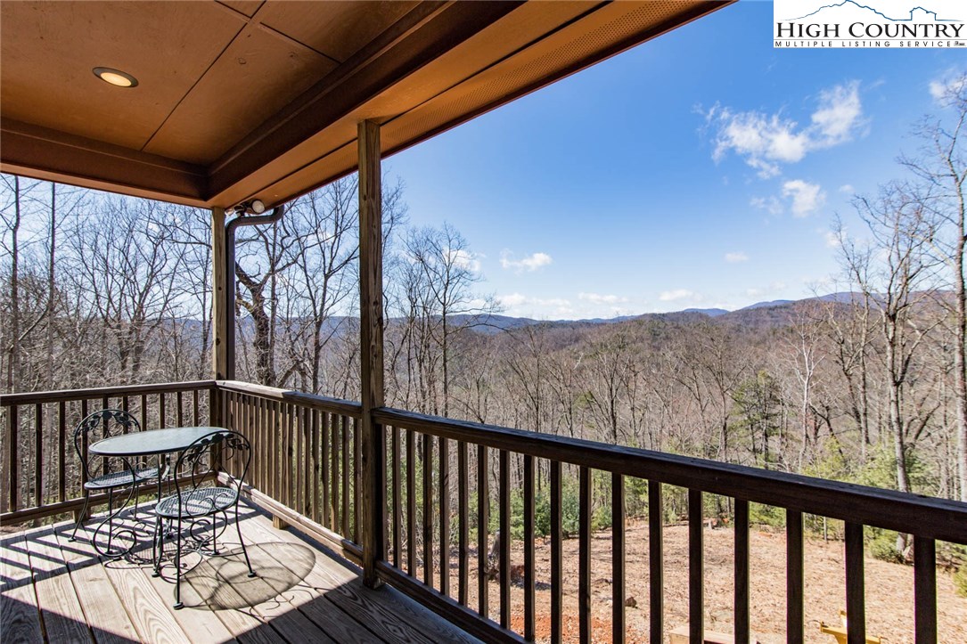 308 Warren Way Road Purlear, NC 28665 - Photo 1 of 49 a view of a balcony with furniture