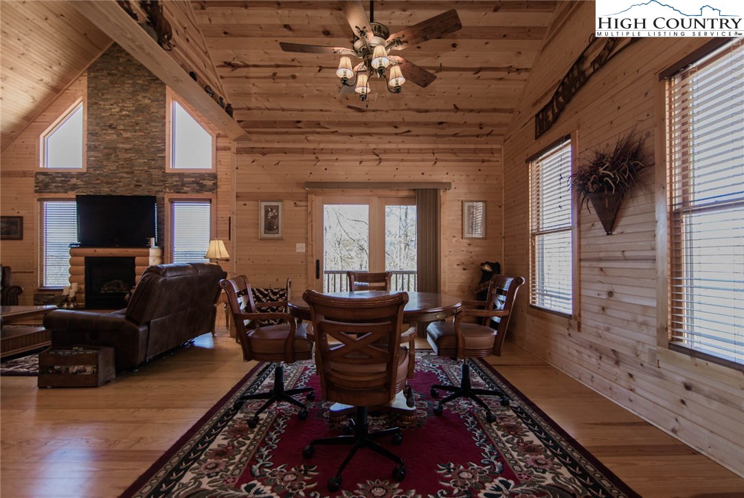 308 Warren Way Road Purlear, NC 28665 - Photo 15 of 49 a view of a livingroom with furniture window and wooden floor