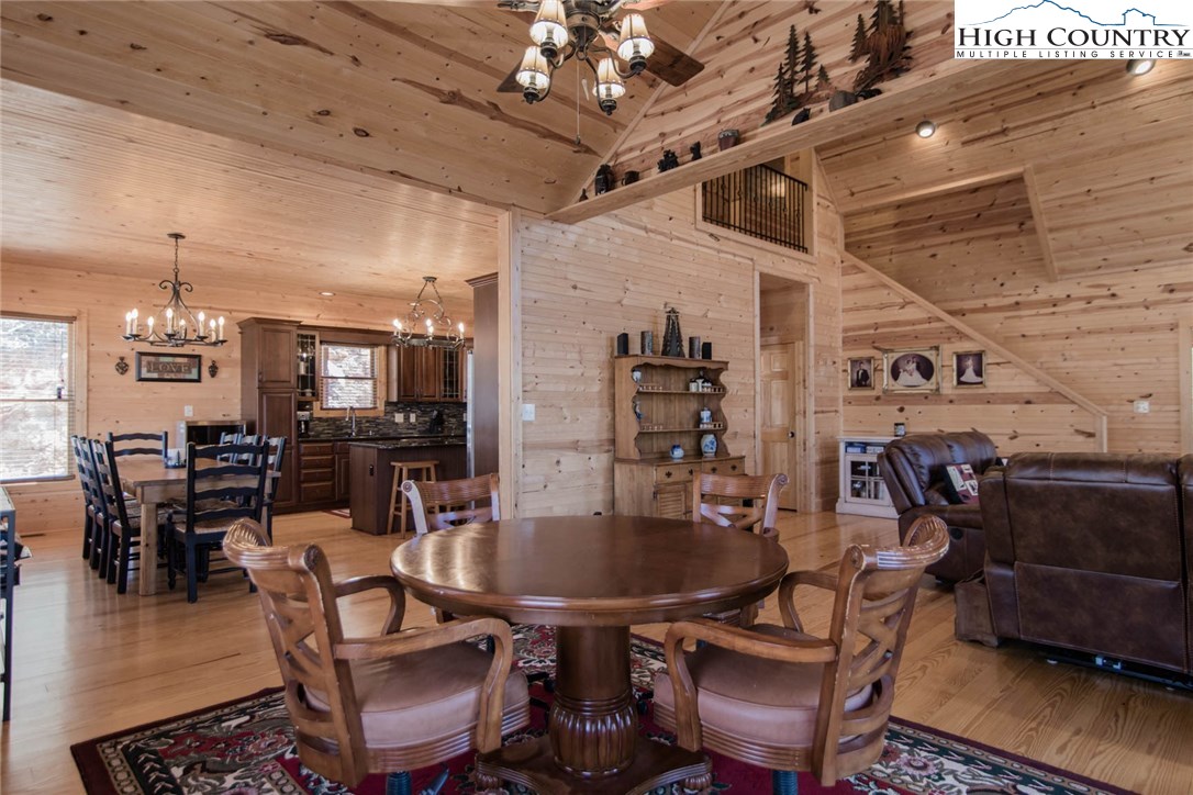 308 Warren Way Road Purlear, NC 28665 - Photo 17 of 49 a dining room with furniture a chandelier and window