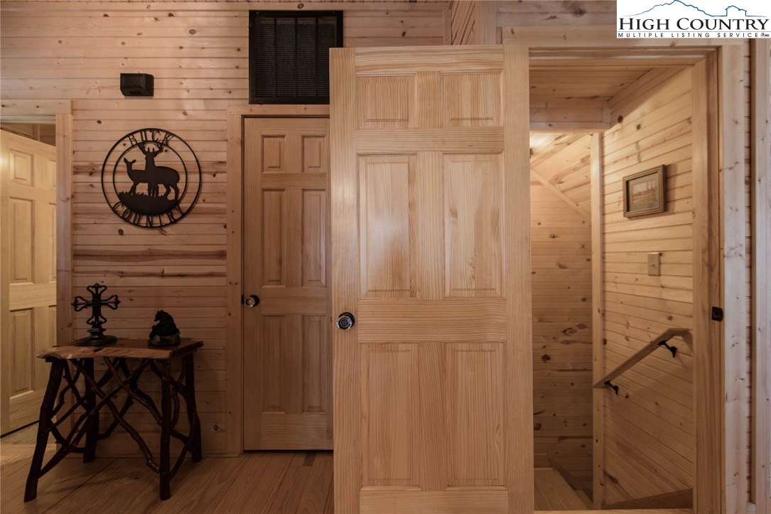 308 Warren Way Road Purlear, NC 28665 - Photo 31 of 49 a view of a door and chair in the room