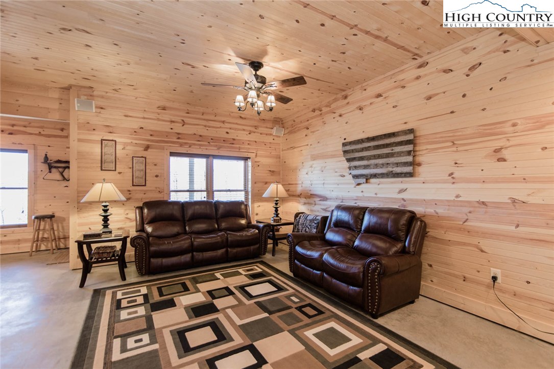 308 Warren Way Road Purlear, NC 28665 - Photo 35 of 49 a living room with furniture and wooden floor