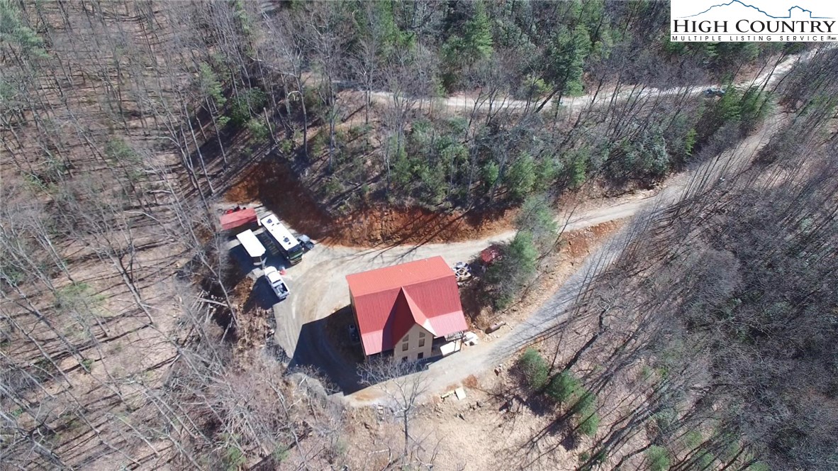 308 Warren Way Road Purlear, NC 28665 - Photo 41 of 49 a view of a yard with plants and trees