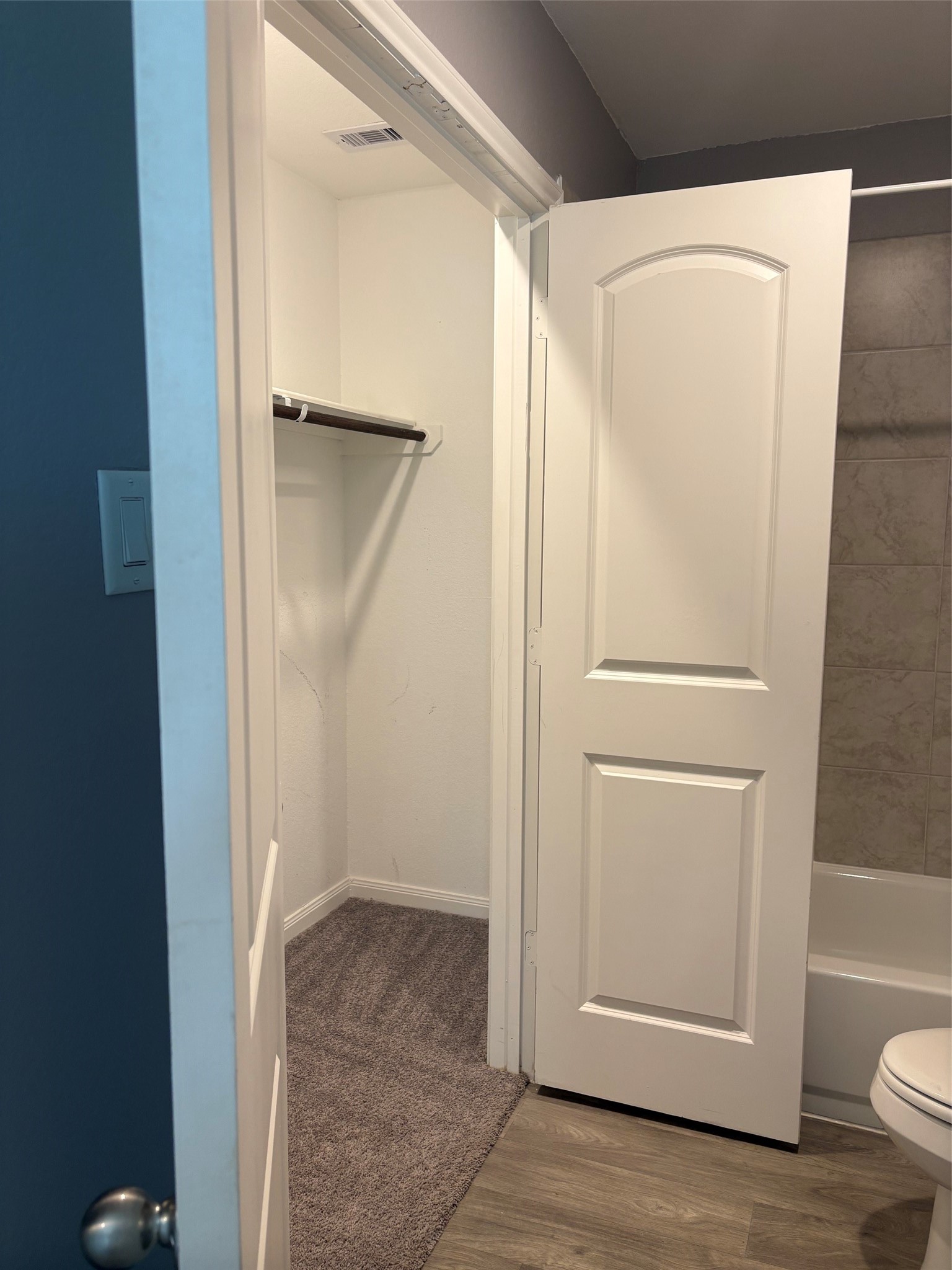9822 Emerald Stone Way Conroe, TX 77306 - Photo 6 of 12 Master closet through Master Bath