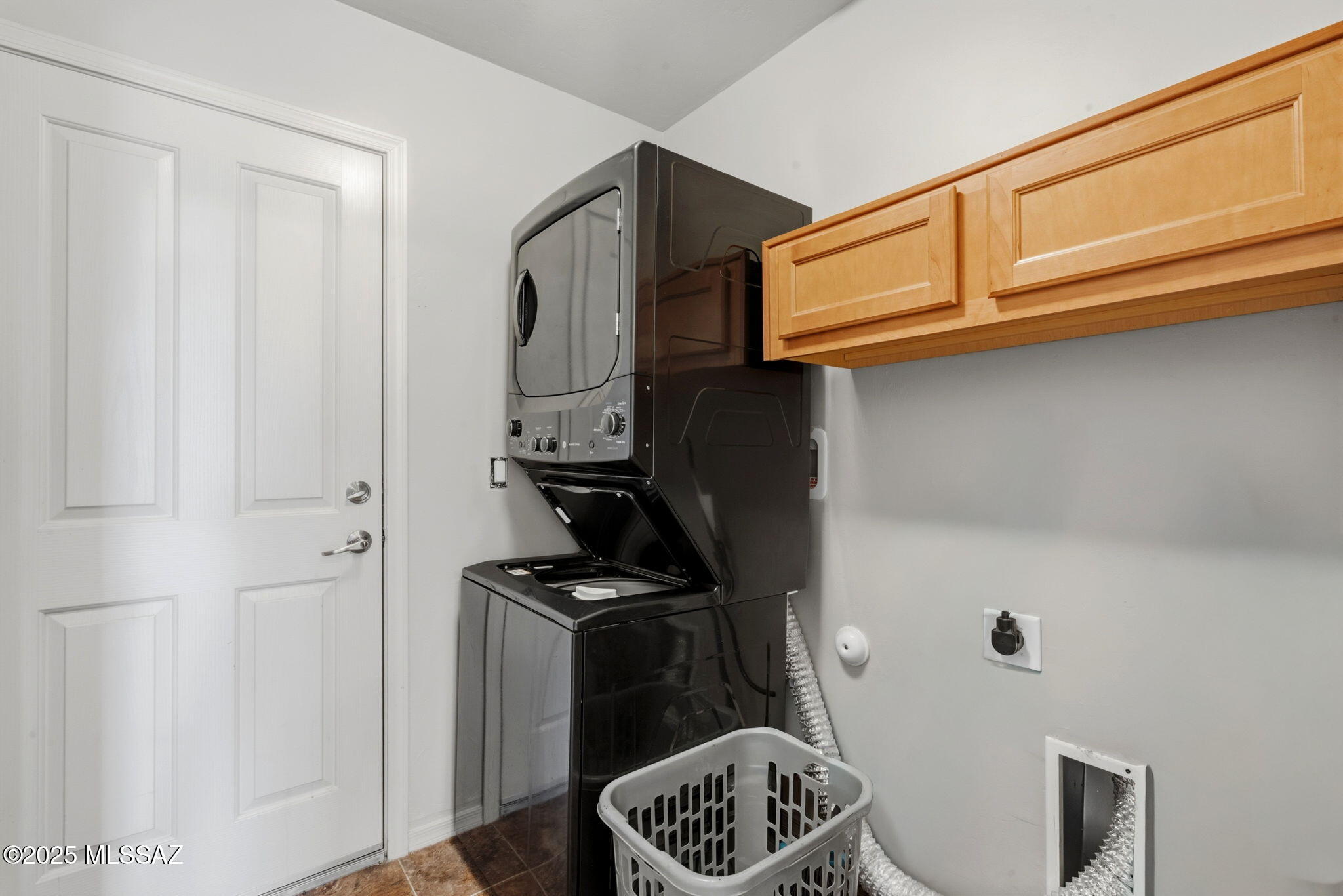 1458 North Wentworth Road Vail, AZ 85641 - Photo 12 of 44 a kitchen with a refrigerator and a stove