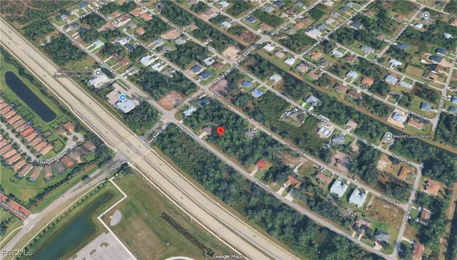 $54,900 | 613-615 Meadow Road, Lehigh Acres, FL 33973