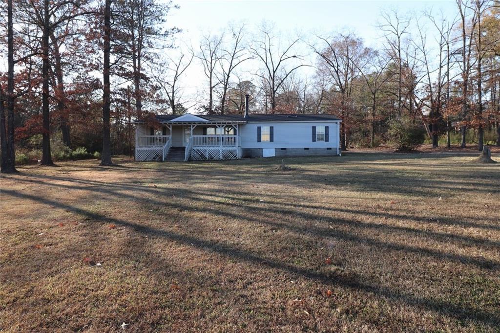 a house view with a outdoor space