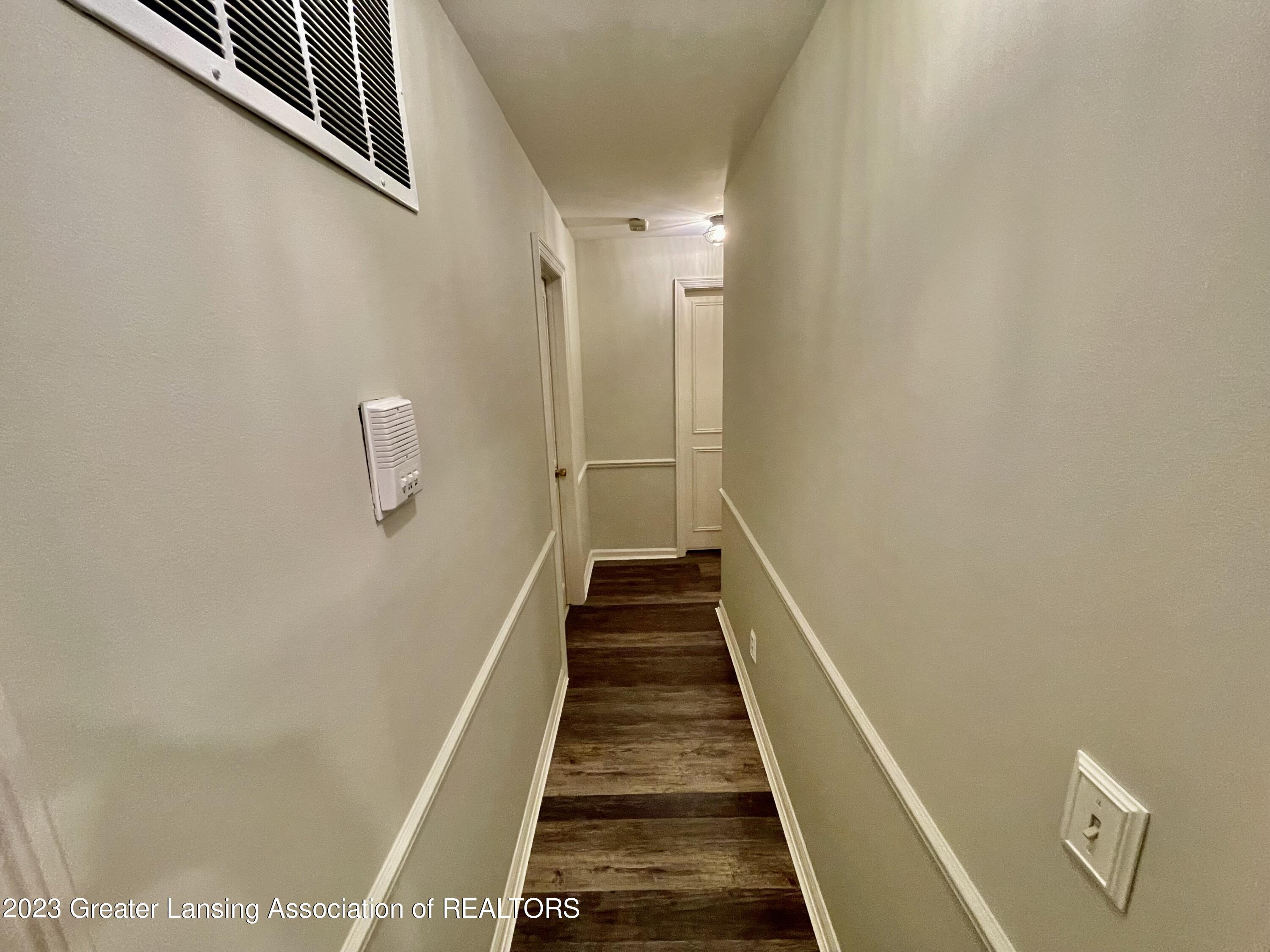 1740 Wellington Road, Unit 112 Lansing, MI 48910 - Photo 13 of 28 Hallway to Master