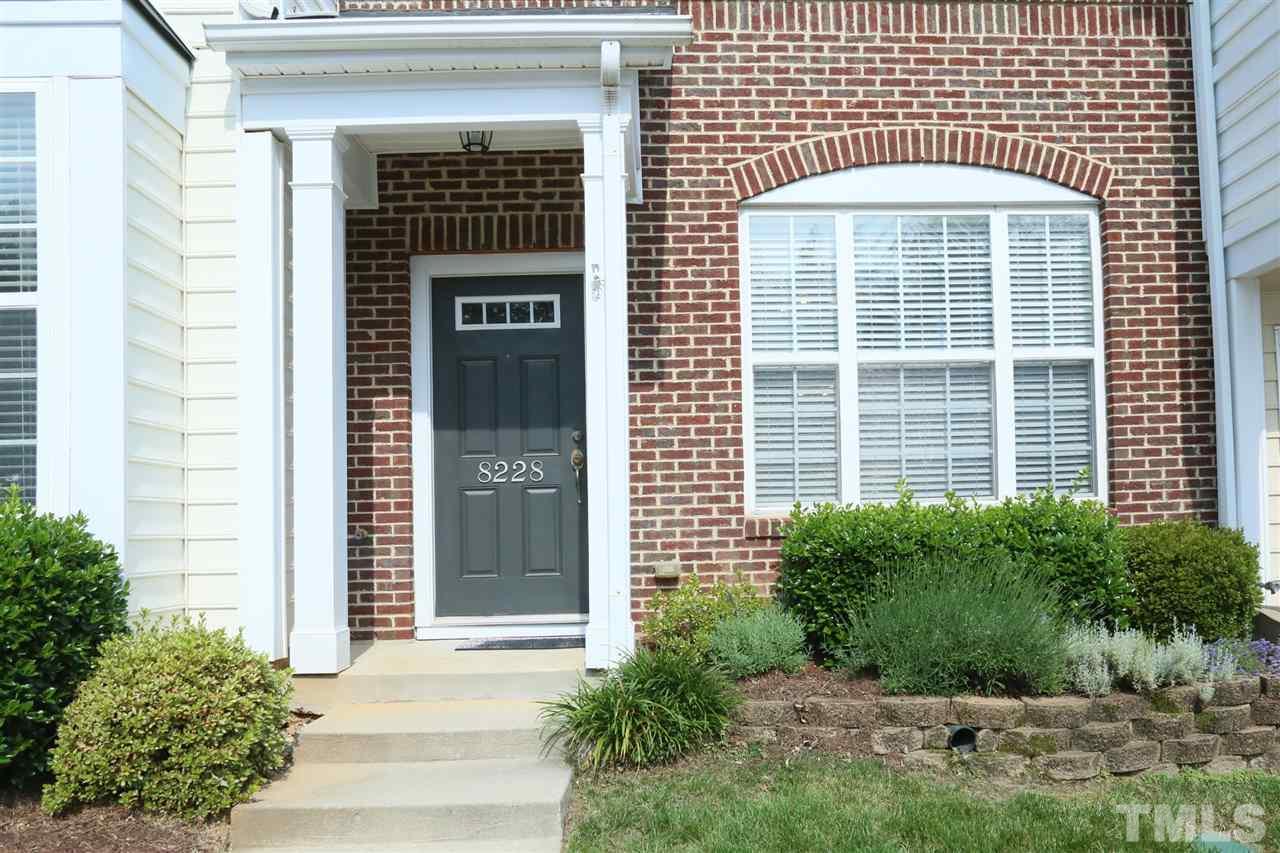 8228 City Loft Court Raleigh, NC 27613 - Photo 2 of 27 a front view of a house with a yard