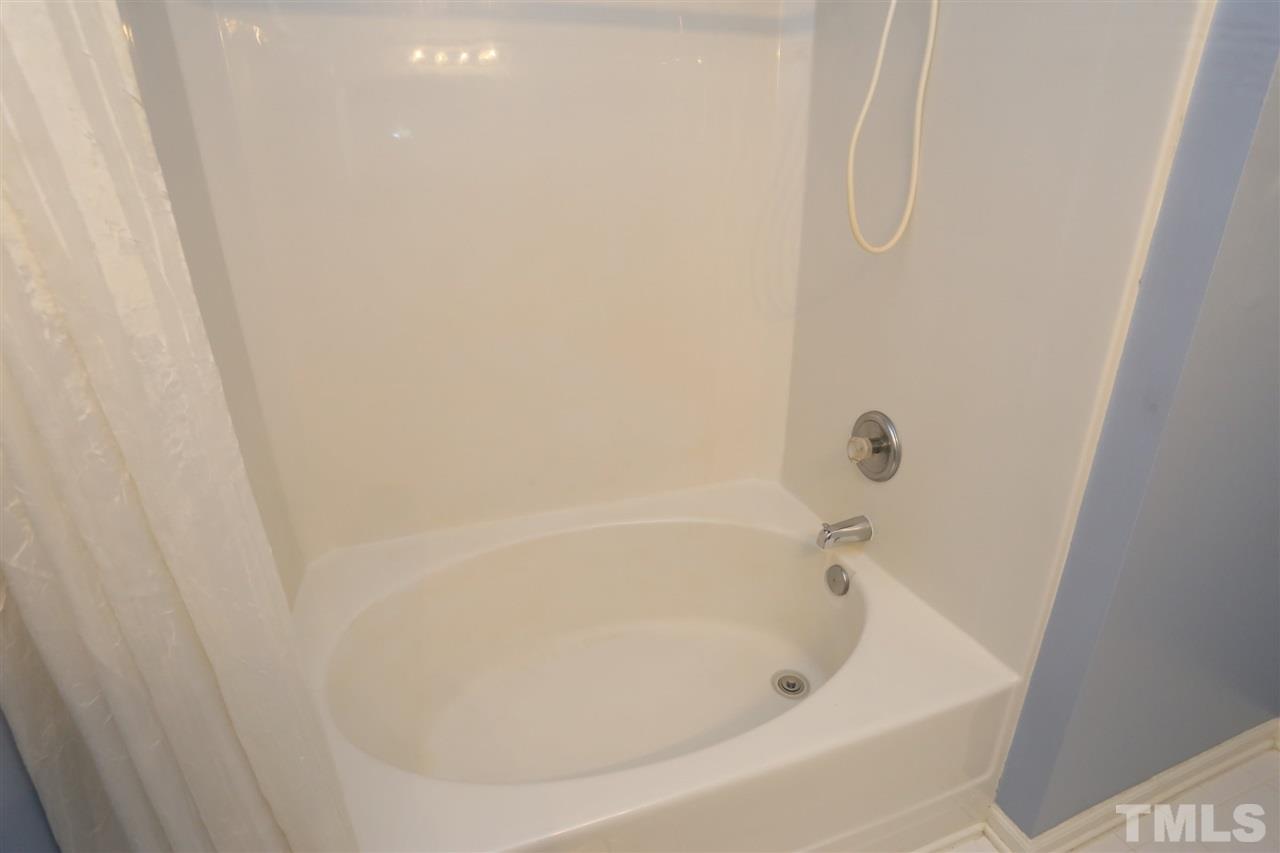 8228 City Loft Court Raleigh, NC 27613 - Photo 20 of 27 a close view of a bathtub in bathroom