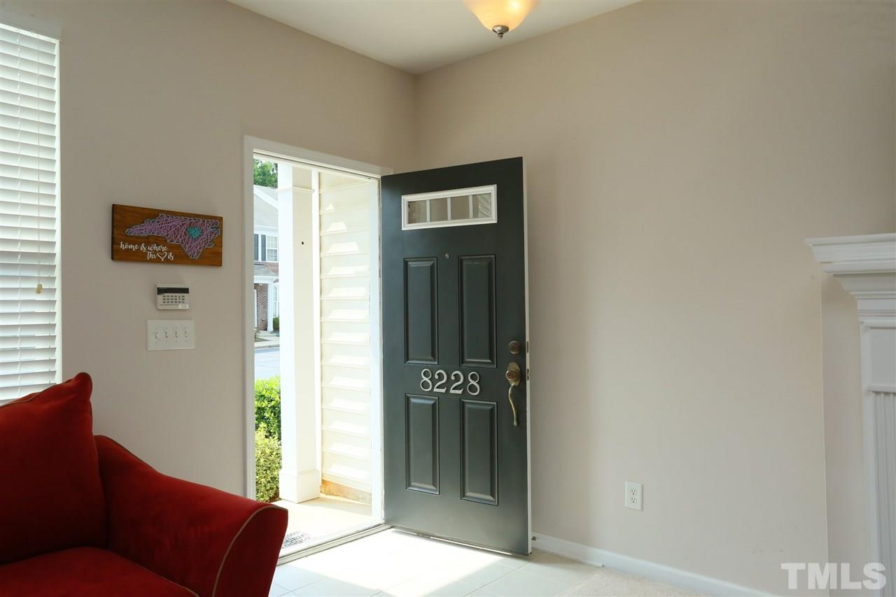 8228 City Loft Court Raleigh, NC 27613 - Photo 3 of 27 a living room with furniture and a window