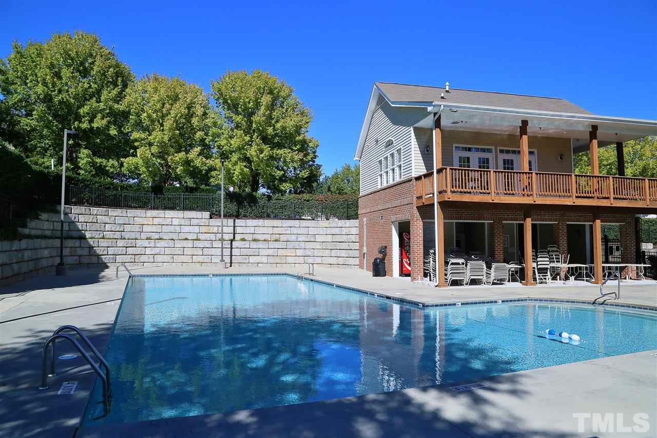8228 City Loft Court Raleigh, NC 27613 - Photo 27 of 27 a view of a building with many windows