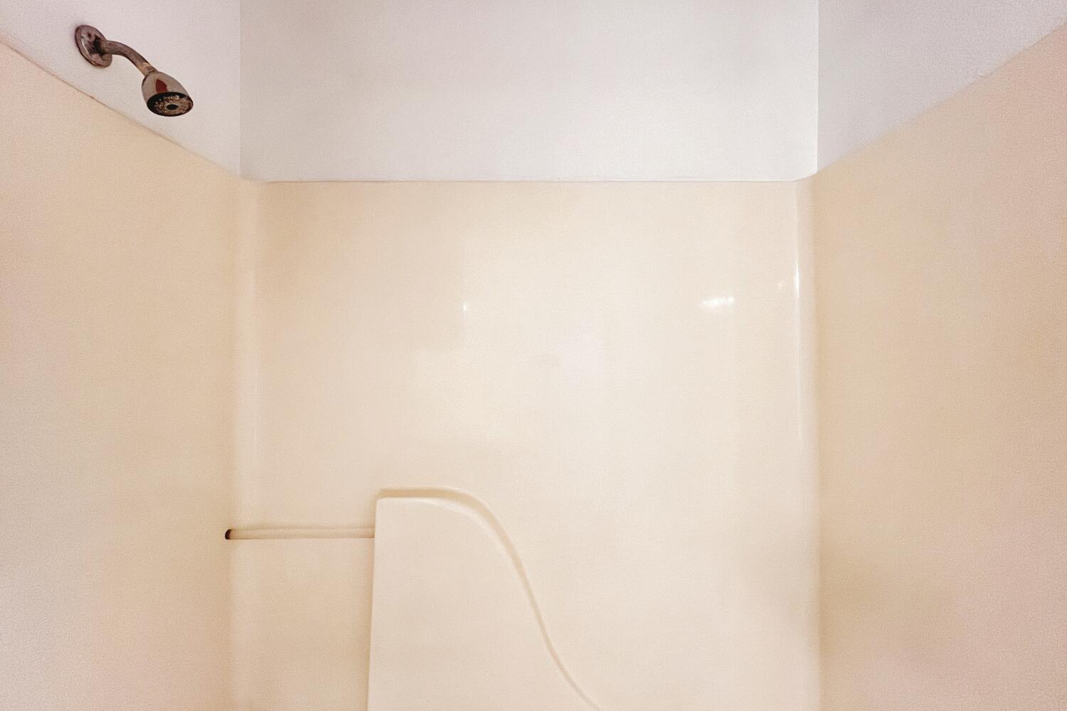 6114 10th Street Lubbock, TX 79416 - Photo 18 of 24 a close view of a bathroom shower