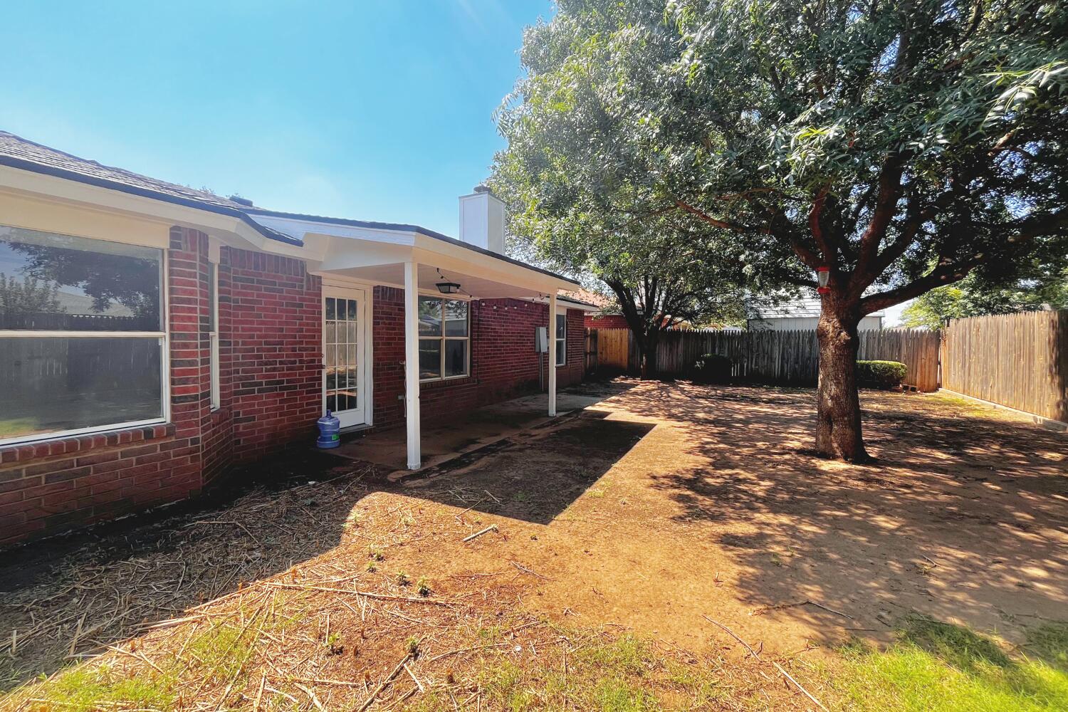 6114 10th Street Lubbock, TX 79416 - Photo 23 of 24 a view of a house with a yard