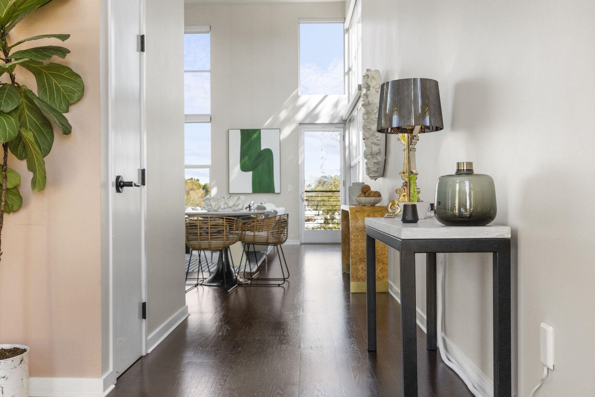 1007 41st Street, Unit 334 Oakland, CA 94608 - Photo 2 of 59 a view of living room kitchen and entryway