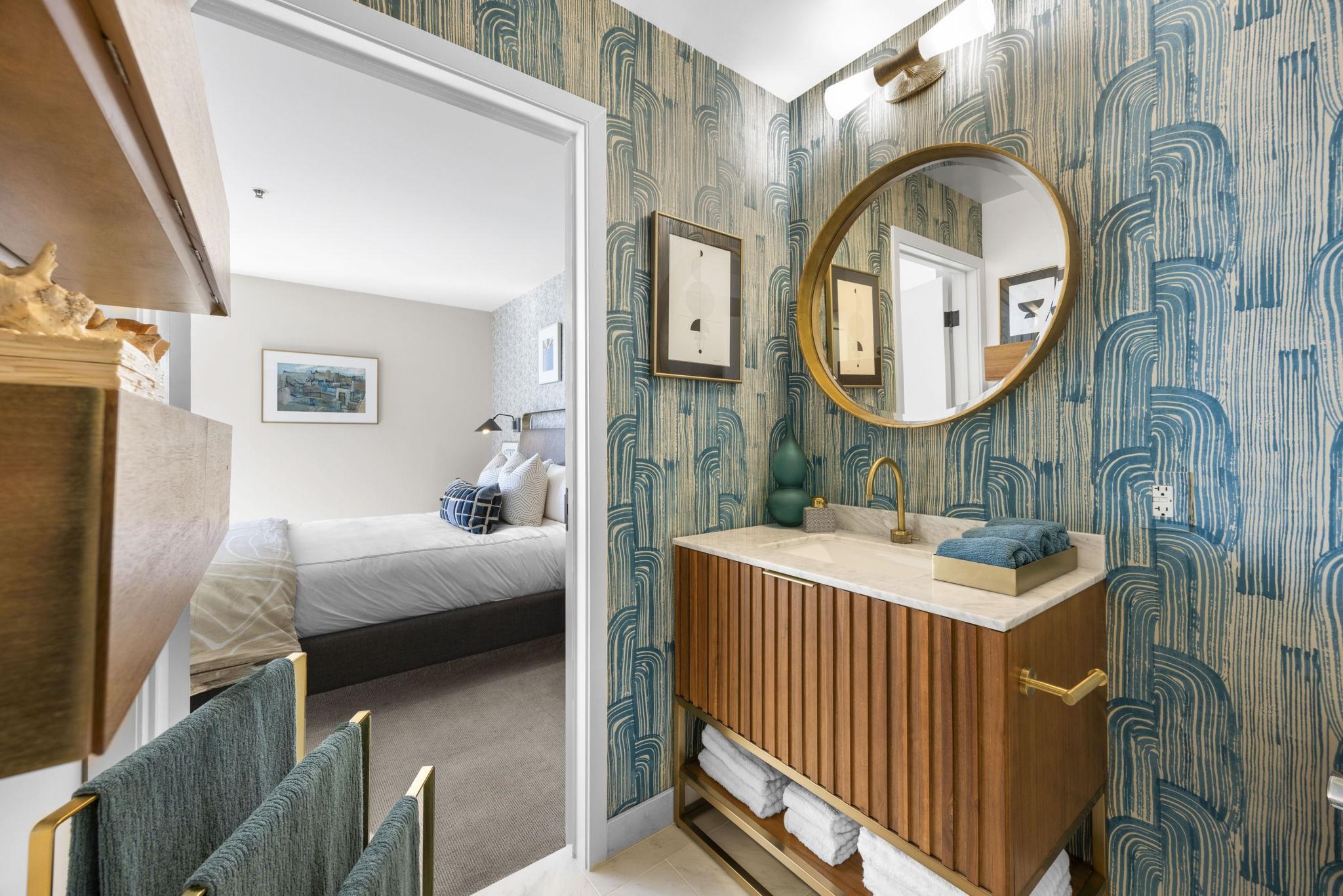 1007 41st Street, Unit 334 Oakland, CA 94608 - Photo 29 of 59 a bedroom with a bed and a mirror