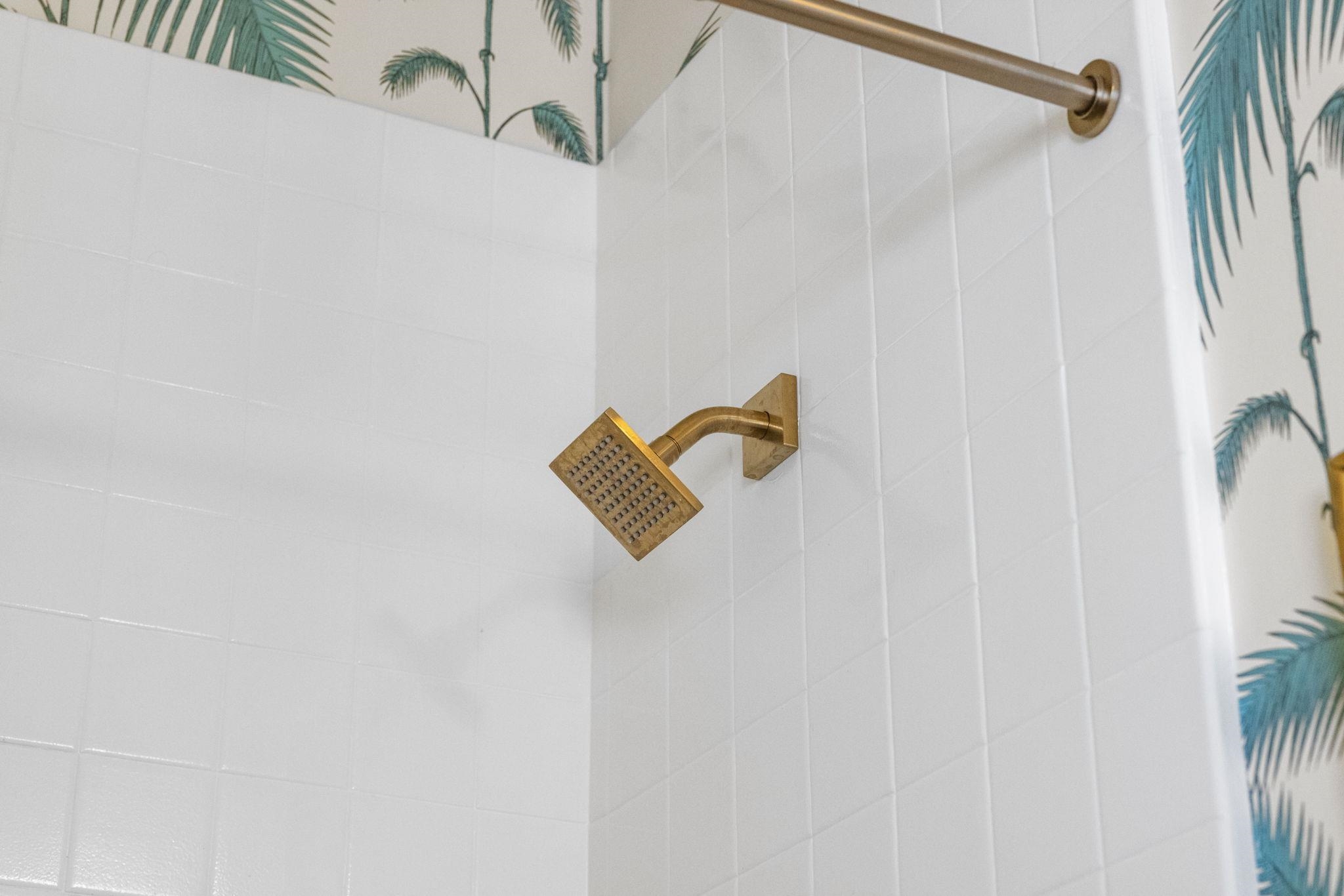 1007 41st Street, Unit 334 Oakland, CA 94608 - Photo 32 of 59 a bathroom with a shower curtain and a window