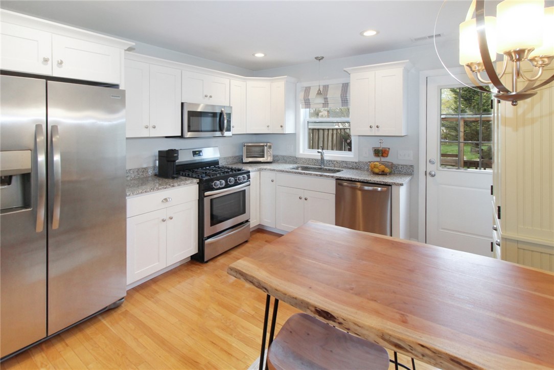 37 Mariner Way Middletown, RI 02842 - Photo 13 of 36 Kitchen has stainless appliances, gas cooking and granite counter tops.