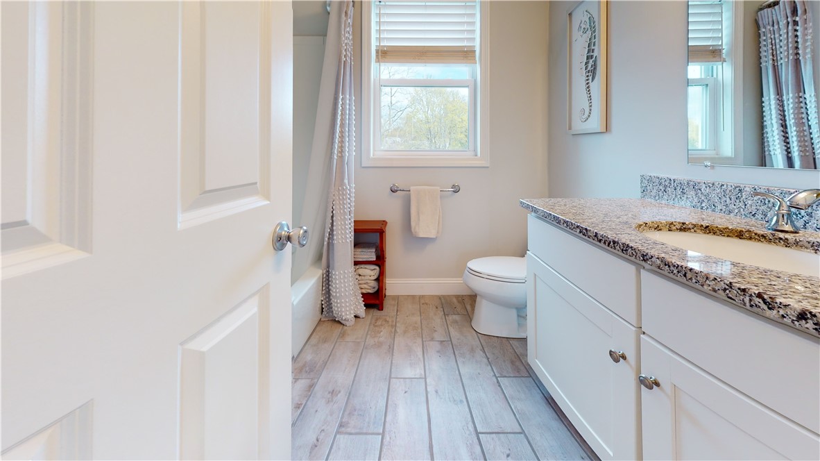 37 Mariner Way Middletown, RI 02842 - Photo 26 of 36 Main Bathroom on the 2nd Floor. Tile Floor, Vanity w/ Granite & tub and shower enclosure.