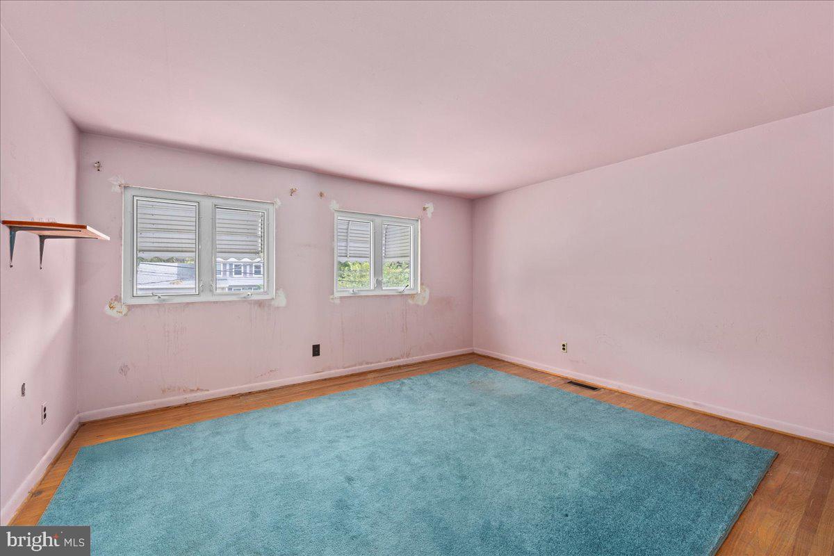 404 Franklin Road Glassboro, NJ 08028 - Photo 11 of 24 an empty room with windows