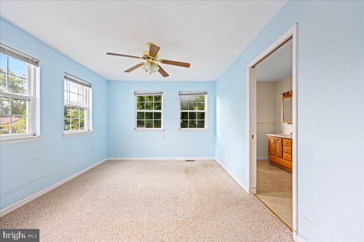 404 Franklin Road Glassboro, NJ 08028 - Photo 10 of 24 a view of empty room with windows