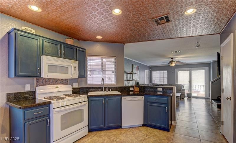 10456 Processor Court Las Vegas, NV 89129 - Photo 4 of 8 Kitchen with a sink, plenty of natural light, a pe