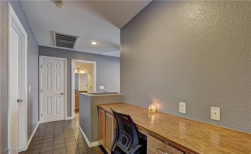 10456 Processor Court Las Vegas, NV 89129 - Photo 7 of 8 Office featuring dark tile patterned floors, visib
