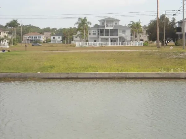 a view of a lake with a large building