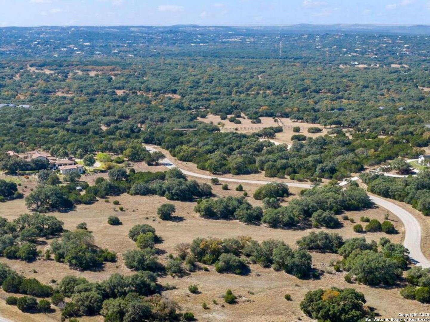 Lot 13 Sendero Ridge Boerne, TX 78006 - Photo 12 of 15 an aerial view of house with yard and mountain view in back