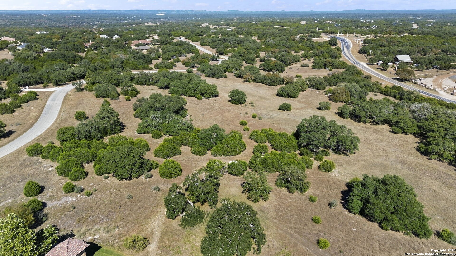 Lot 13 Sendero Ridge Boerne, TX 78006 - Photo 8 of 15 an aerial view of a city with lots of residential buildings
